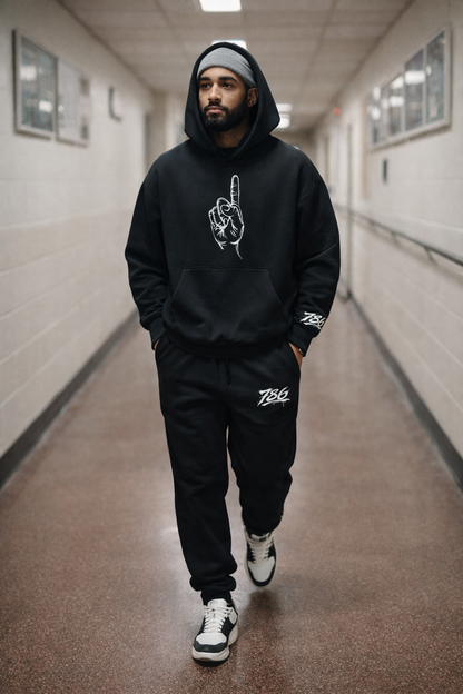 Model walking in Halal Vibes 786 Tawheed Edition Hoodie and Joggers.
