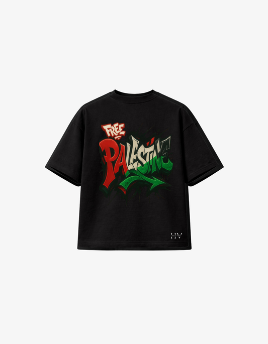 Black oversized Free Palestine T-shirt with graffiti-inspired lettering in the red, green, white and black colours of the Palestinian flag.