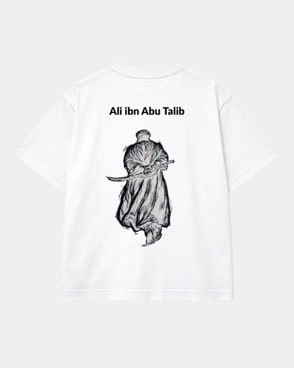 White oversized Ali ibn Abi Talib T-shirt with minimal Halal Vibes front logo and monochrome symbolic warrior illustration on the back.