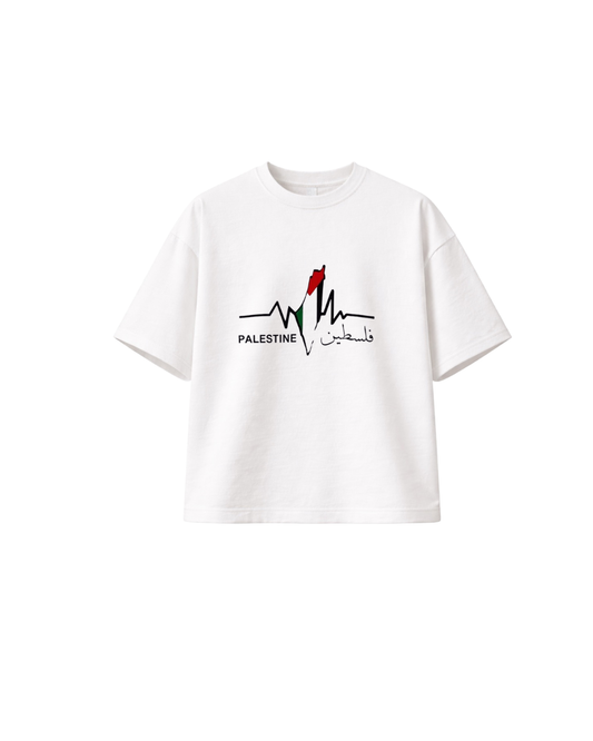 White oversized Palestine T-shirt featuring a heartbeat line, Palestine silhouette in Palestinian colours, and Palestine written in English and Arabic.