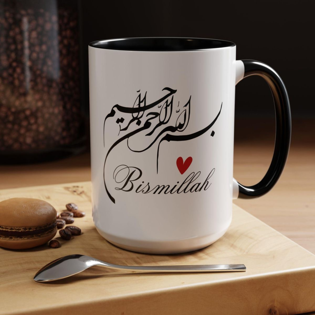 White ceramic mug with black handle featuring Arabic Bismillah calligraphy and a red heart.