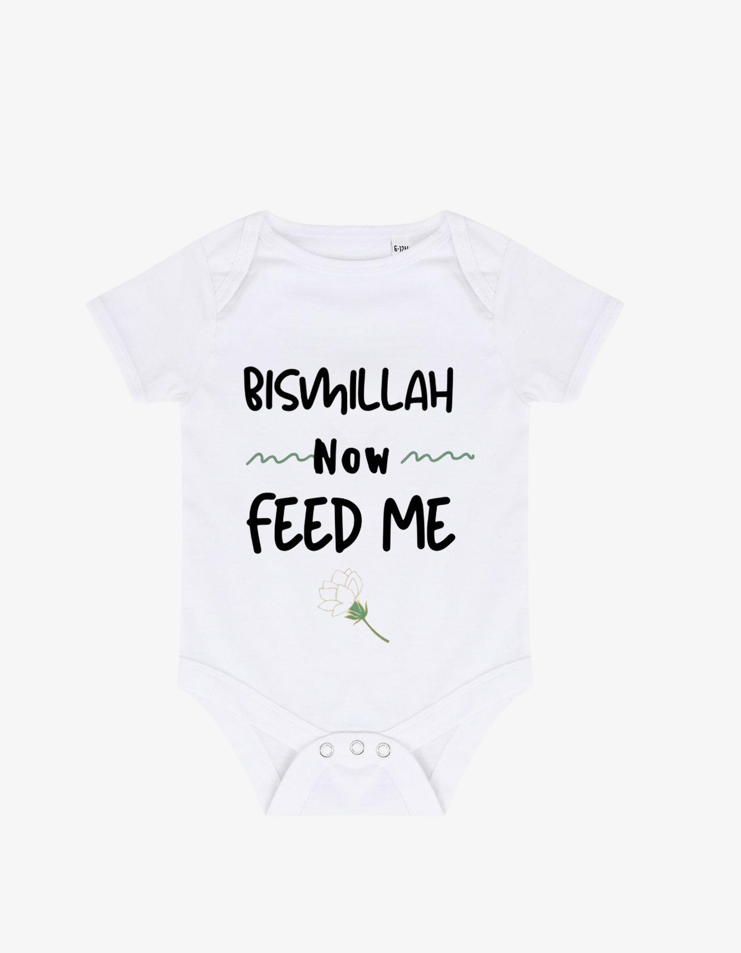 White baby grow with black typography saying Bismillah Now FEED ME and a small white rose illustration.