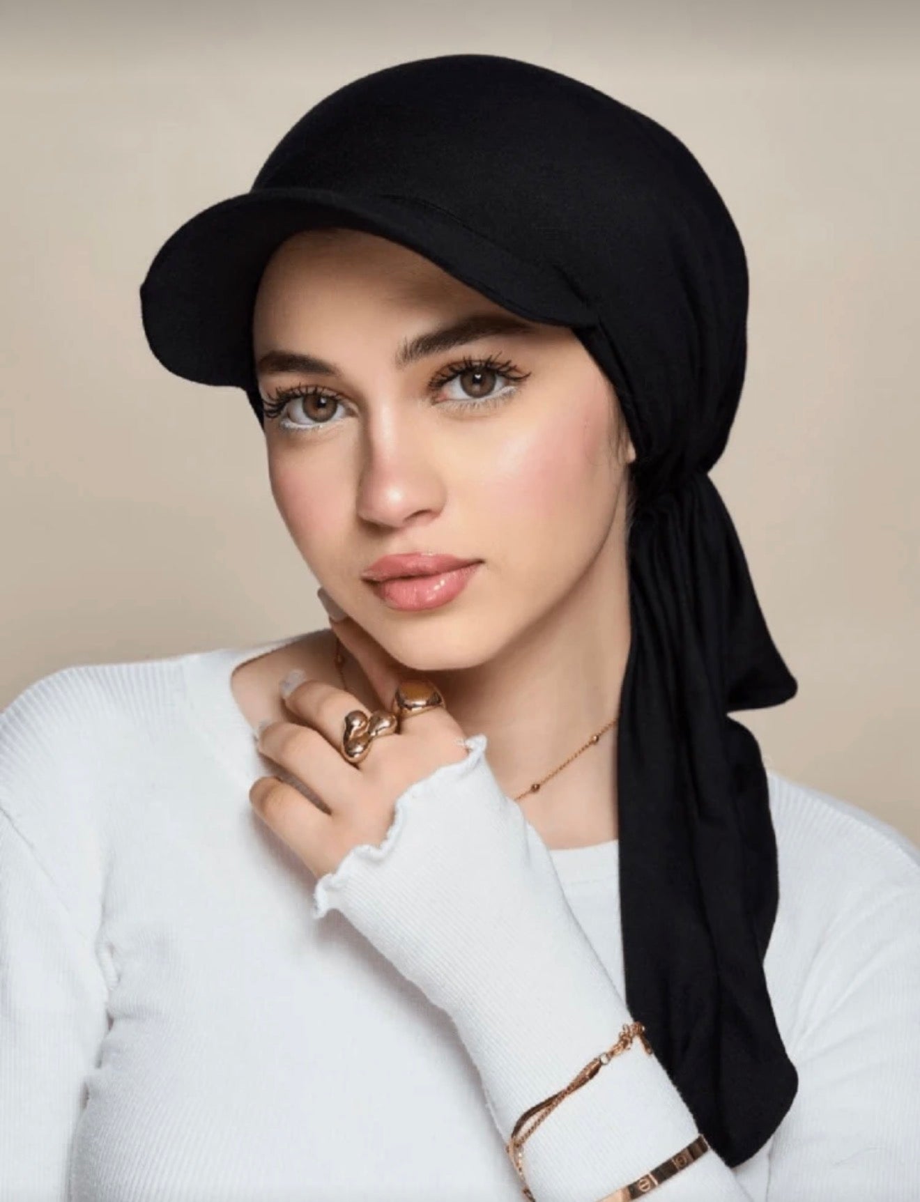 Model wearing BlackCasual Hijab Cap with integrated baseball peak and wrap-around tail
