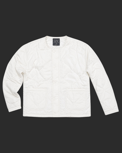 White quilted jacket on a black background