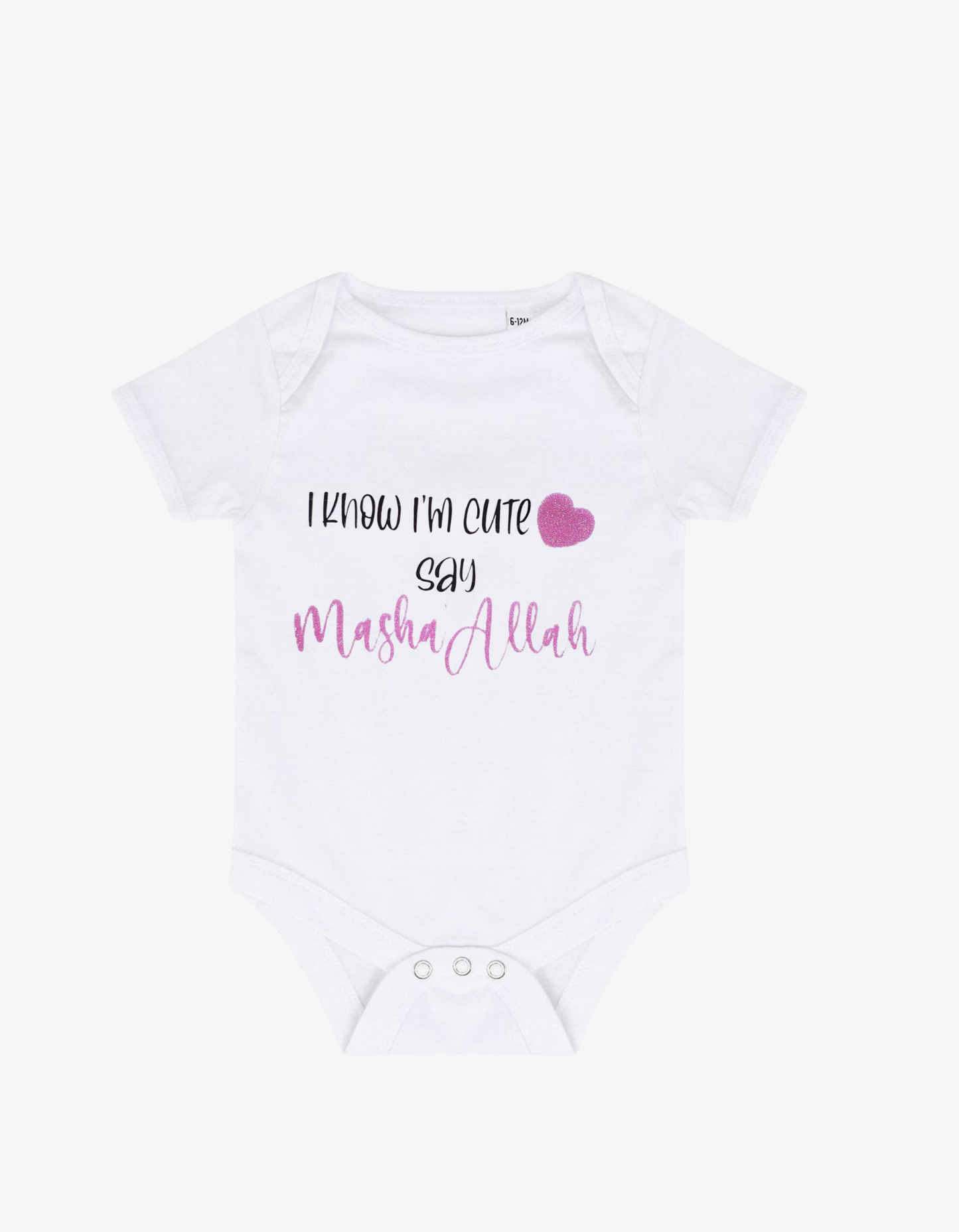 White baby grow with pink glitter heart and text saying I know I'm cute say Masha'Allah.