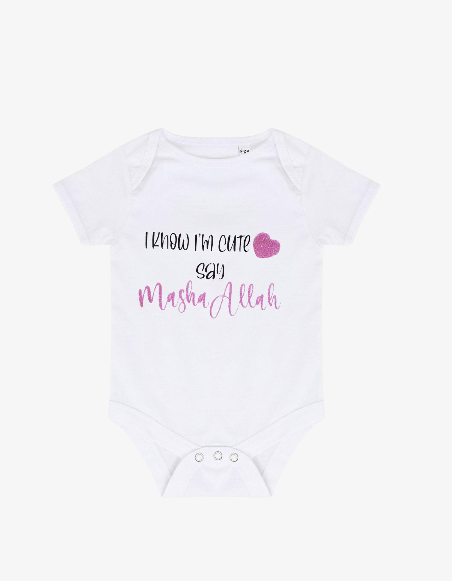 White baby grow with pink glitter heart and text saying I know I'm cute say Masha'Allah.
