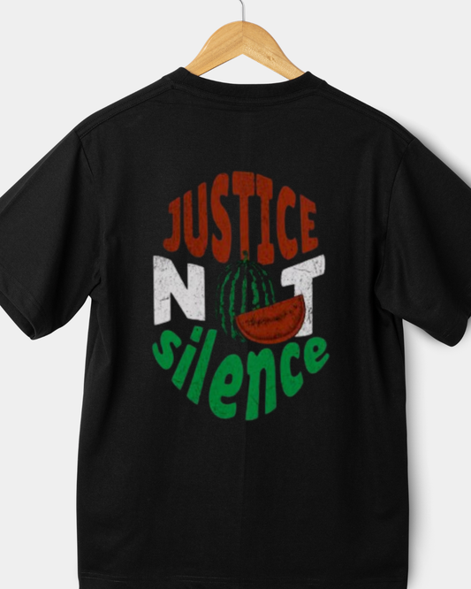 Rear view of a black 220gsm classic fit t-shirt with a circular red, white, and green "JUSTICE NOT SILENCE" graphic and a watermelon icon.