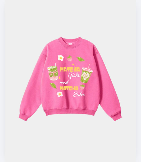 Oversized pink sweatshirt with matcha latte graphics and text saying Matcha Girls Need Sabr.