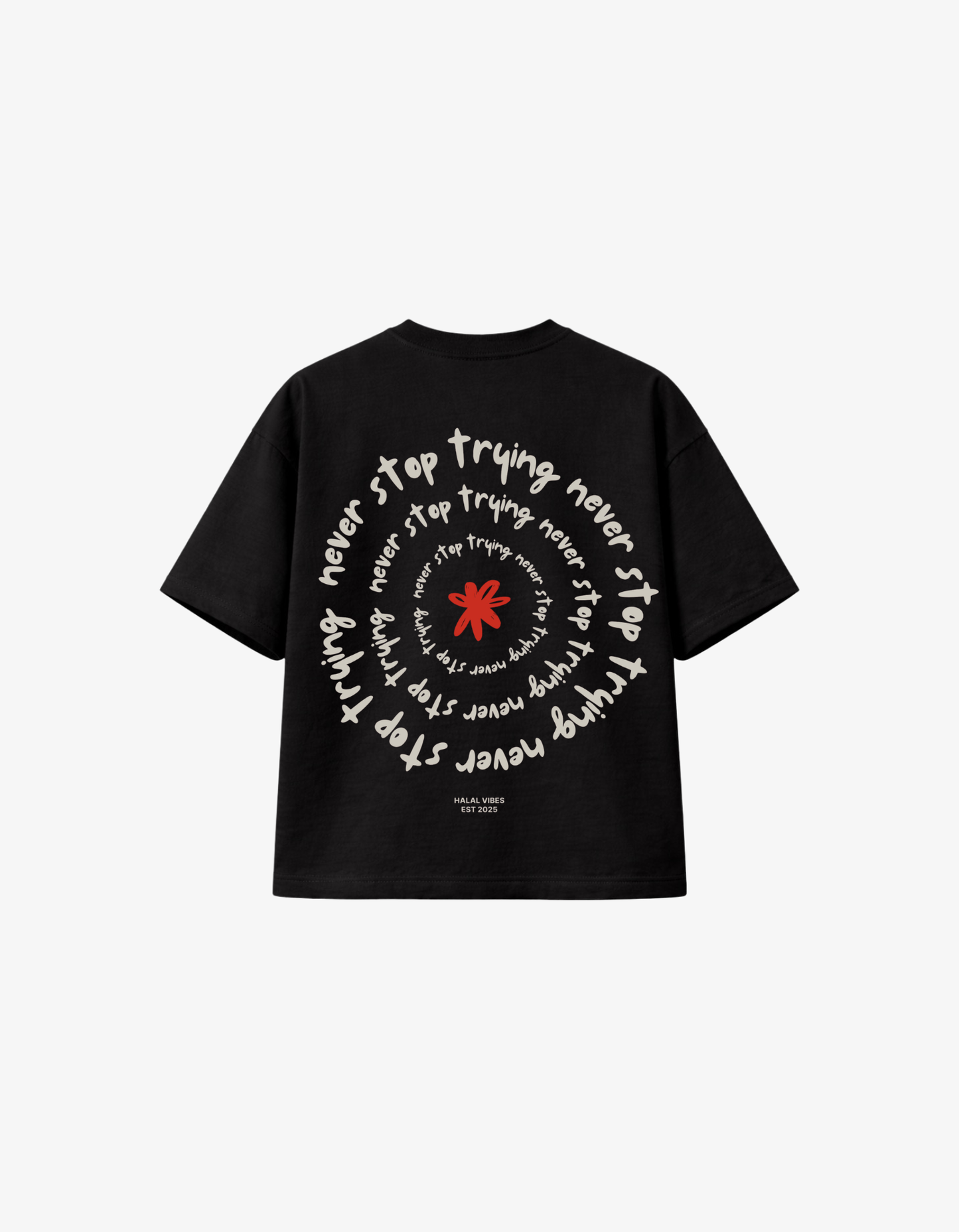 Back view of black streetwear tee featuring a white "Never Stop Trying" spiral typography and red flower.
