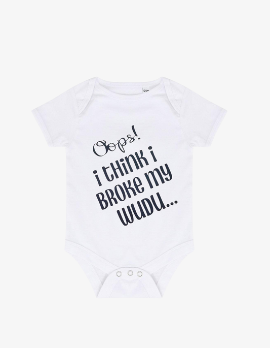 White baby grow with playful black typography saying Oops! i think i BROKE my WUDU...