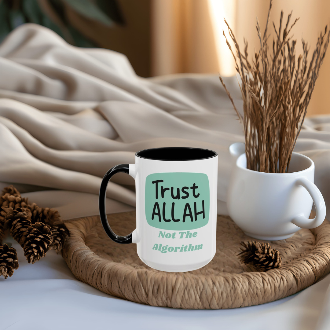 White ceramic mug with black handle and text saying Trust Allah Not The Algorithm on a teal background.